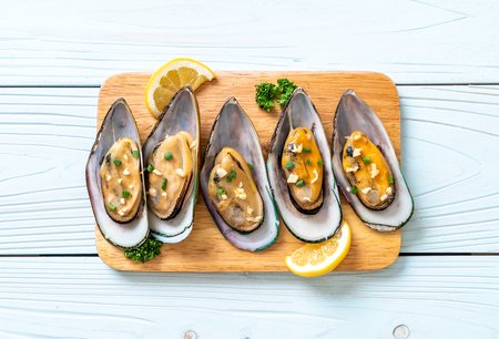 seafood mussels with lemon and garlicの写真素材