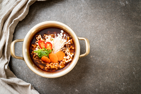 korean instant noodles in golden pot - korean food styleの写真素材