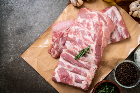 Fresh raw pork ribs with ingredientsの写真素材