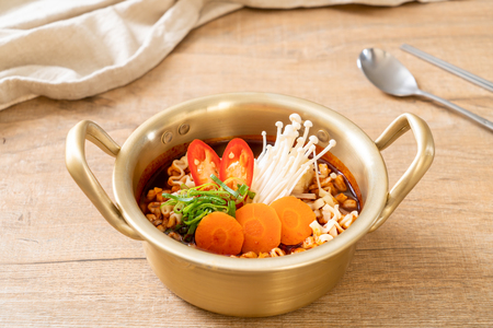 korean instant noodles in golden pot - korean food styleの写真素材