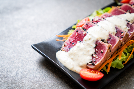 fresh tuna raw with vegetable salad and sauce - healthy foodの写真素材