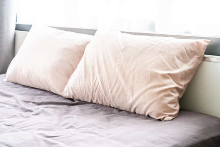 comfortable pillow on bed interior decoration in bedroomの写真素材