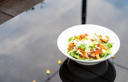 Caesar Salad on white plate - healthy food styleの写真素材
