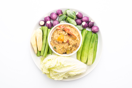 Chili paste simmer with crab or crab and soya dip with coconut milk and vegetables isolated on white backgroundの写真素材