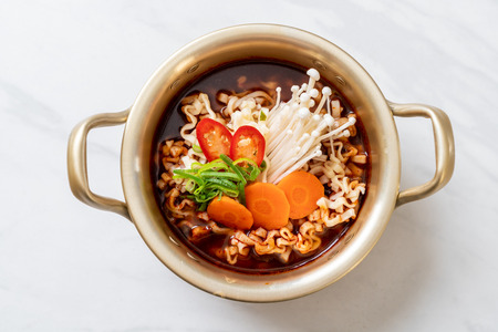 korean instant noodles in golden pot - korean food styleの写真素材