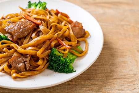 stir-fried noodles with pork and vegetable - Asian food styleの写真素材