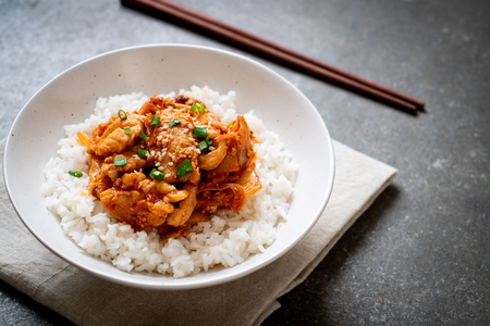 stir-fried pork with kimchi on topped rice - Korean food styleの写真素材