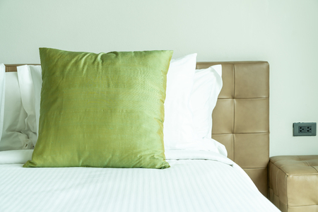 beautiful pillow on bed decoration in bedroom interiorの写真素材
