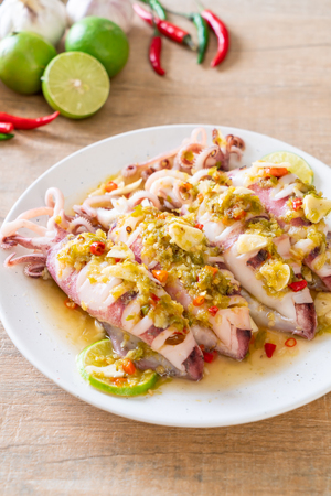 Steamed Squids or Octopus with Spicy Chili and Lemon Lime Sauceの写真素材