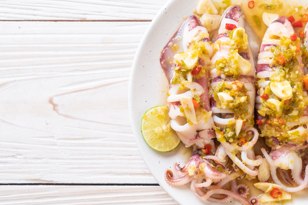 Steamed Squids or Octopus with Spicy Chili and Lemon Lime Sauceの写真素材