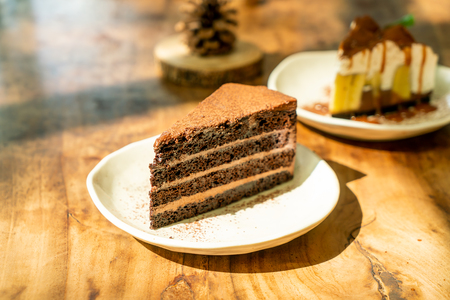 Dark Chocolate Cheesecake on plate in cafe restaurantの写真素材