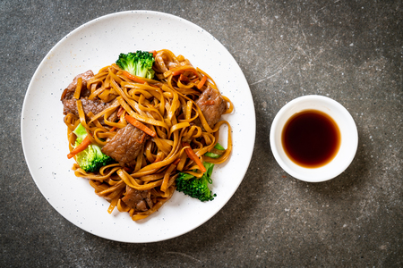 stir-fried noodles with pork and vegetable - Asian food styleの写真素材