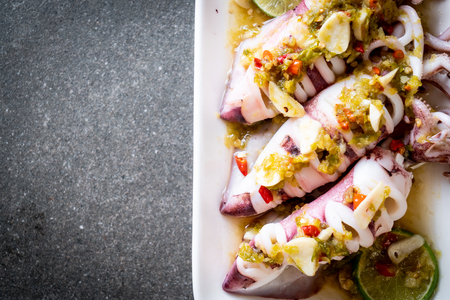 Steamed Squids or Octopus with Spicy Chili and Lemon Lime Sauceの写真素材
