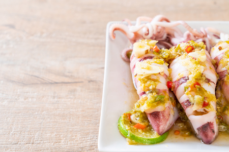 Steamed Squids or Octopus with Spicy Chili and Lemon Lime Sauceの写真素材