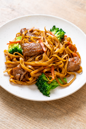 stir-fried noodles with pork and vegetable - Asian food styleの写真素材