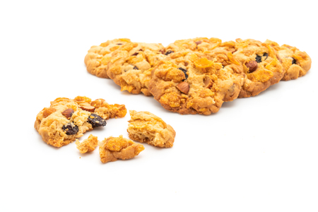 homemade cookies with cornflake raisin and almonds isolated on white backgroundの写真素材