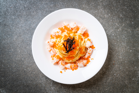 spaghetti creamy with shrimps and shrimp eggs - fusion food styleの写真素材