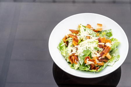 Caesar Salad on white plate - healthy food styleの写真素材