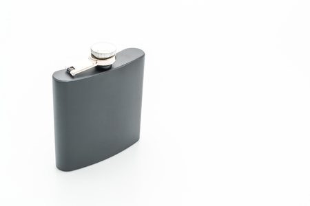 stainless steel hip flask isolated on white backgroundの写真素材