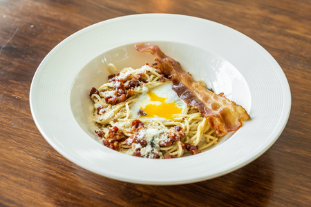 carbonara spaghetti with bacon and egg - Italian food styleの写真素材