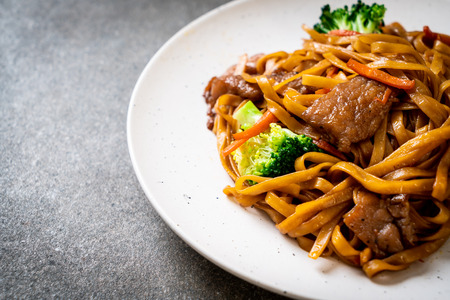 stir-fried noodles with pork and vegetable - Asian food styleの写真素材