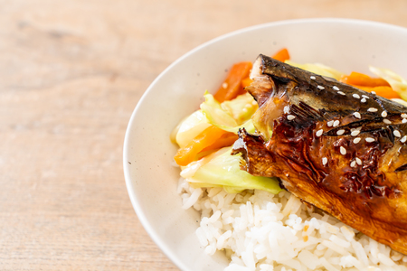 saba fish grilled with teriyaki sauce on topped rice bowl - Japanese styleの写真素材