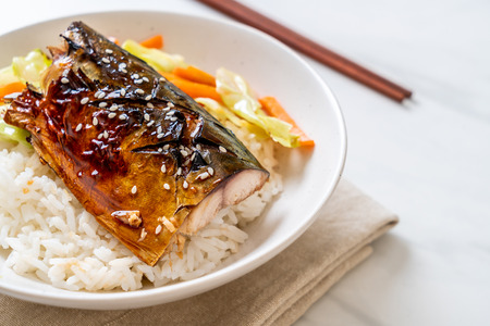saba fish grilled with teriyaki sauce on topped rice bowl - Japanese styleの写真素材