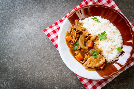 Japanese curry rice with sliced pork, carrot and onions - Asian styleの写真素材