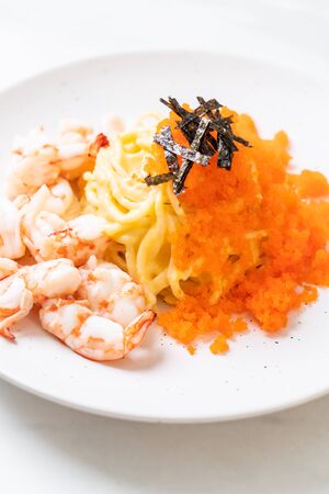 spaghetti creamy with shrimps and shrimp eggs - fusion food styleの写真素材