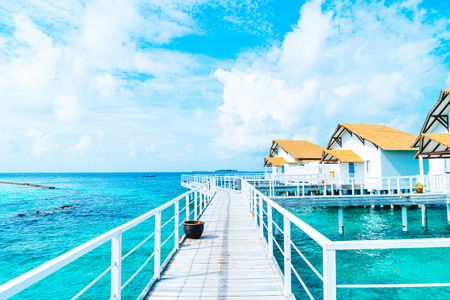 Beautiful tropical Maldives resort hotel and island with beach and sea  - boost up color processing styleのeditorial素材