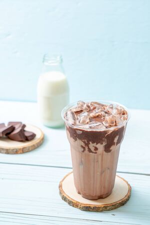 Iced chocolate milkshake drink on wood backgroundの写真素材