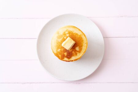 pancakes stack with butter and honey