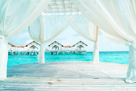 white arch with tropical Maldives resort and sea backgroundのeditorial素材