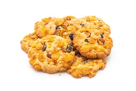 homemade cookies with cornflake raisin and almonds isolated on white backgroundの写真素材