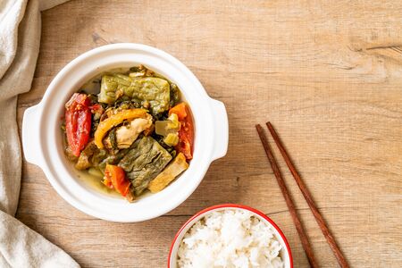 Bitter gourd and preserved mustard green soup with pork - Asian food styleの写真素材