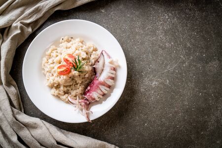homemade squids or octopus risottoの写真素材