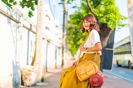 Happy and Beautiful Asian woman traveling at Khao Sarn Road in Thailandの写真素材
