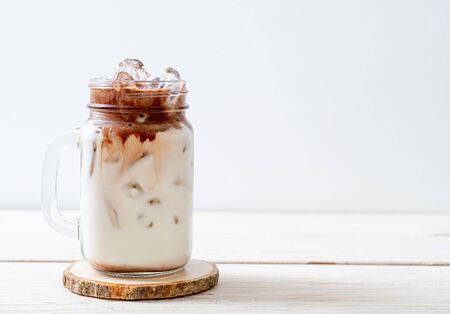 Iced chocolate milkshake drink on wood backgroundの写真素材