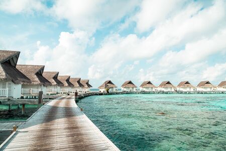 tropical Maldives resort hotel and island with beach and sea for holiday vacation concept - boost up color processing styleの写真素材