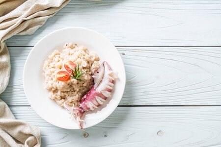 homemade squids or octopus risottoの写真素材