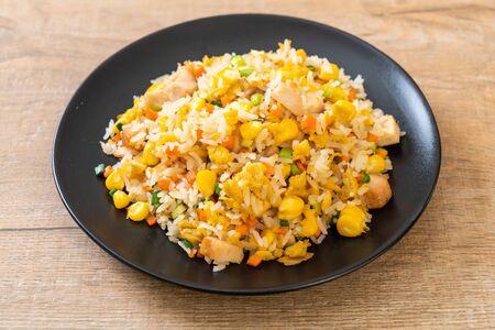 homemade fried rice with chickenの写真素材