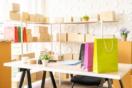 shopping bag on desk in working roomの写真素材