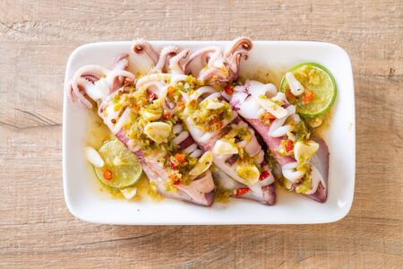 Steamed Squids or Octopus with Spicy Chili and Lemon Lime Sauceの写真素材