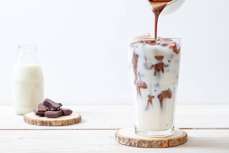 Iced chocolate milkshake drink on wood backgroundの写真素材