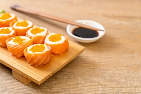 fresh salmon sushi roll with mayonnaise and shrimp egg - Japanese food styleの写真素材