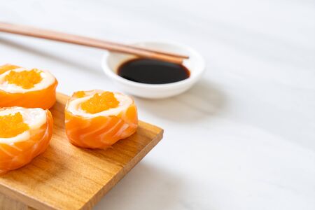 fresh salmon sushi roll with mayonnaise and shrimp egg - Japanese food styleの写真素材
