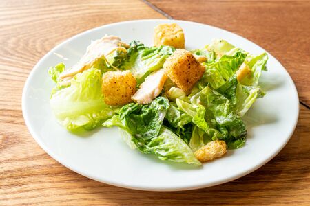 Caesar salad with chicken - healthy food styleの写真素材