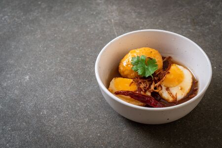 Fried Boiled Egg with Tamarind Sauce or Sweet and Sour Eggsの写真素材