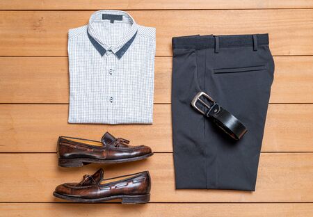 Beautiful casual men fashion and clothes set on woodの写真素材