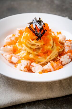 spaghetti creamy with shrimps and shrimp eggs - fusion food styleの写真素材